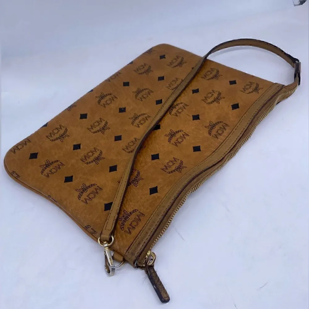 MCM authentic Cognac visetos zip Pouch entrupy COA
